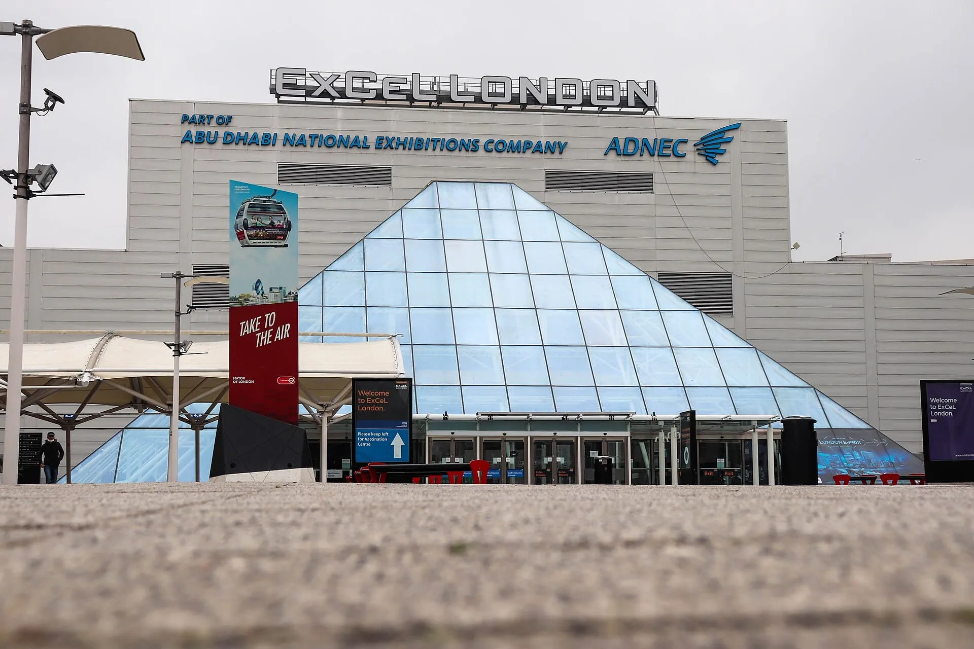 The glass entrance of ExCeL London, where NIAXO exhibits at DSEI